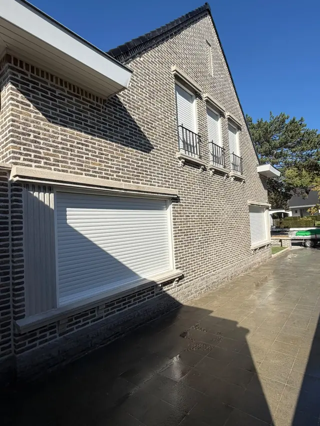 Zijgevel van de woning in Kortrijk na het hervoegen